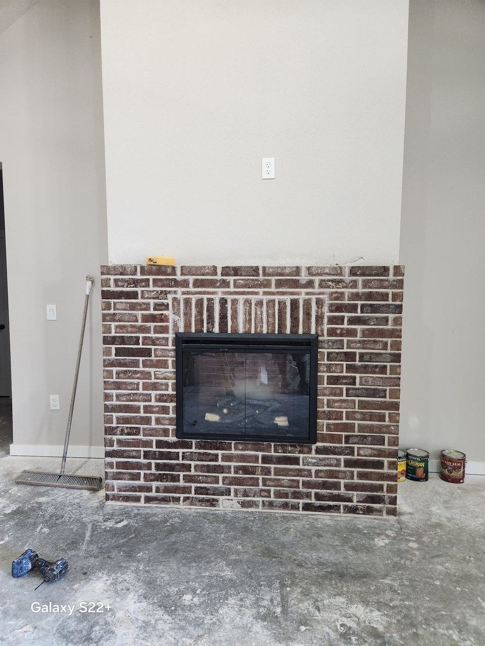 Finished brick fireplace with a gas insert near Beaver Creek