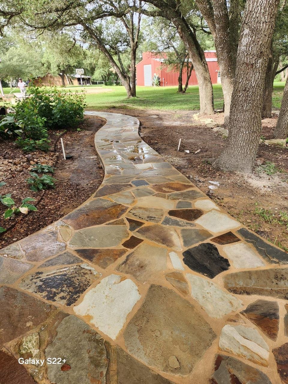 Finished flagstone path in a garden near Round Top, TX