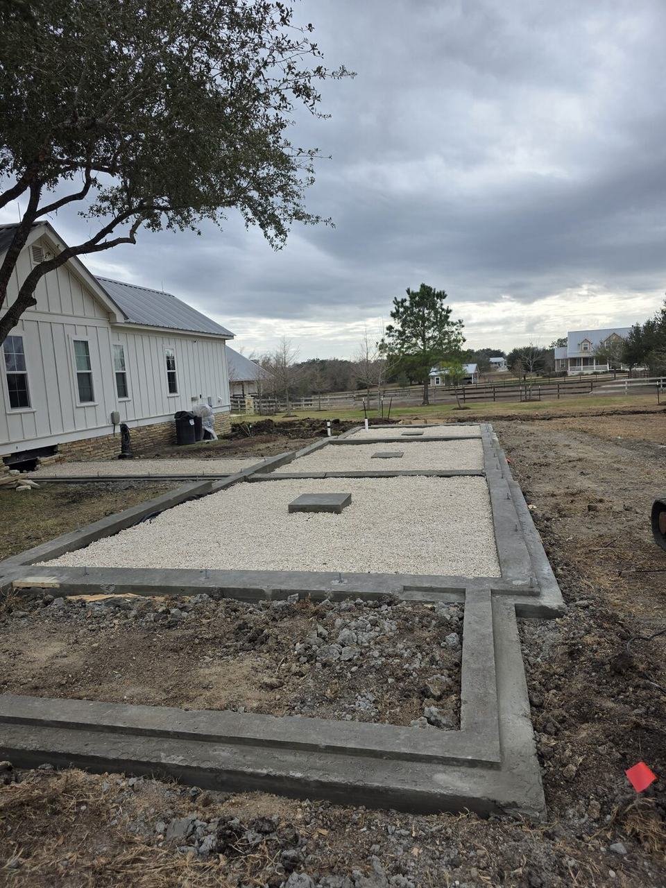 Poured patio edge near Round Top, TX