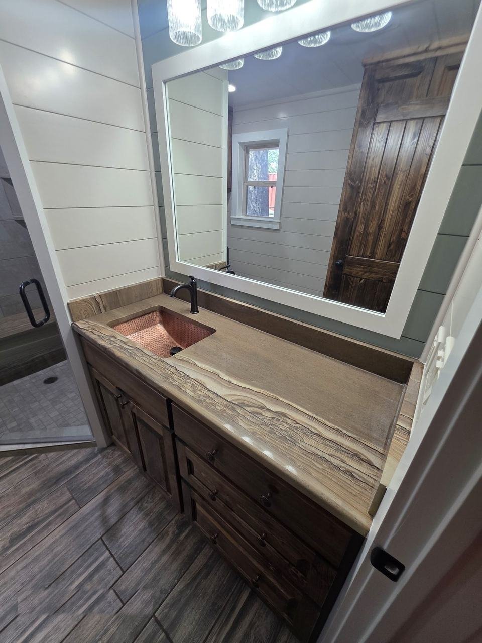 Bathroom vanity with natural stone countertop in Giddings, TX